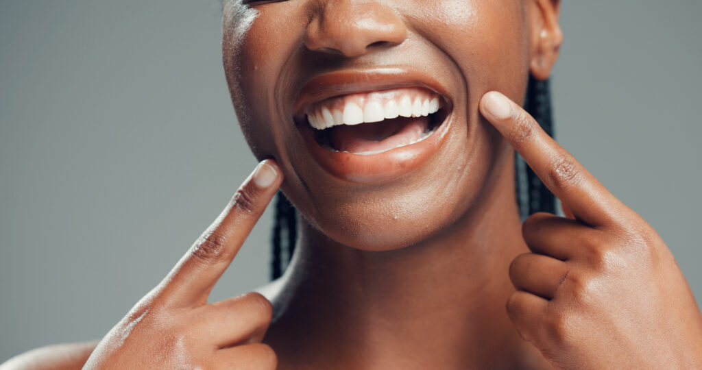 woman smiling with straight white teeth