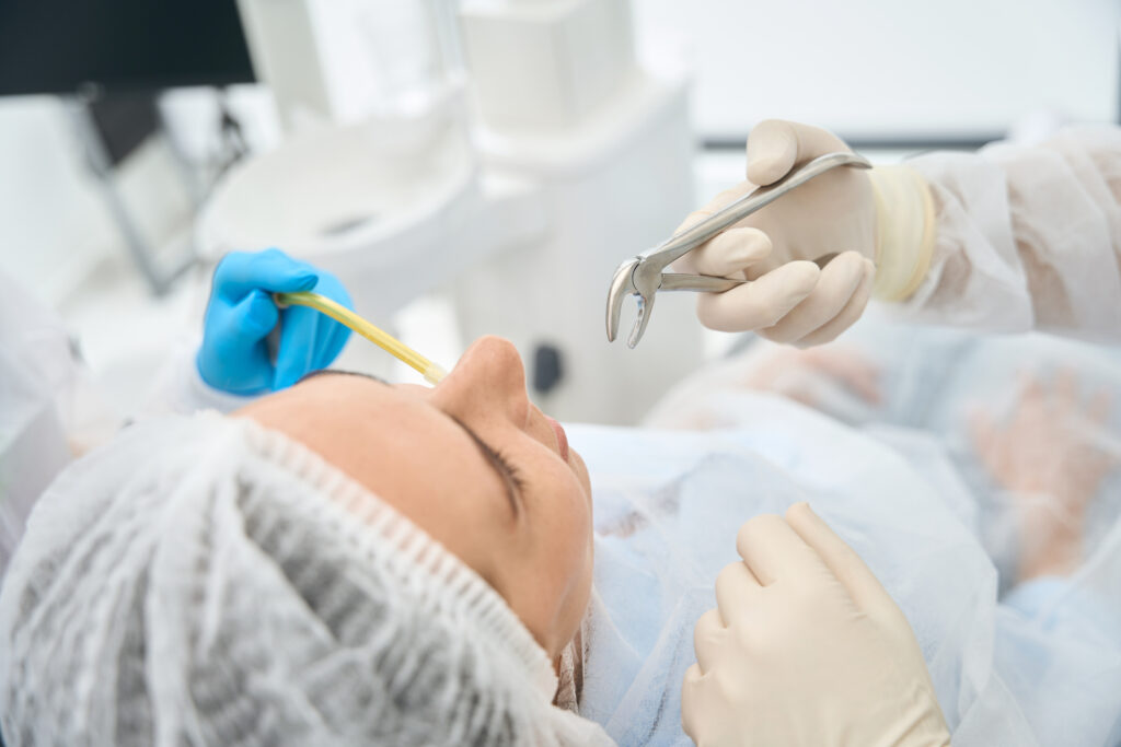 Patient undergoing a tooth extraction