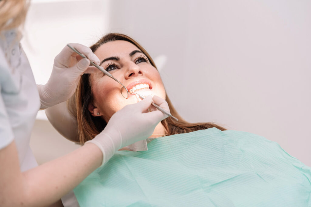 Patient undergoing a dental exam at the dental office