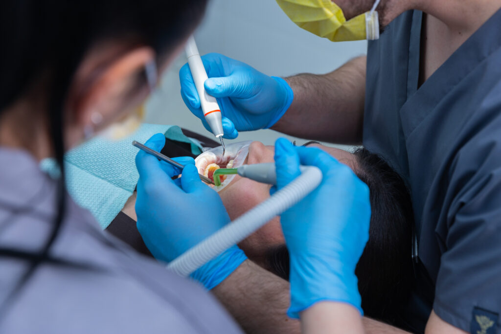 Patient undergoing a dental extraction