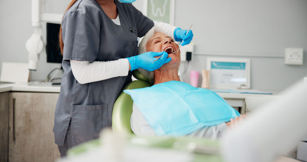 Patient undergoing a tooth extraction in the dental office