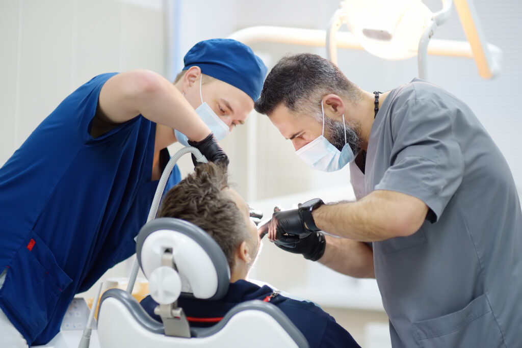 Dentist using dental sedation on a patient