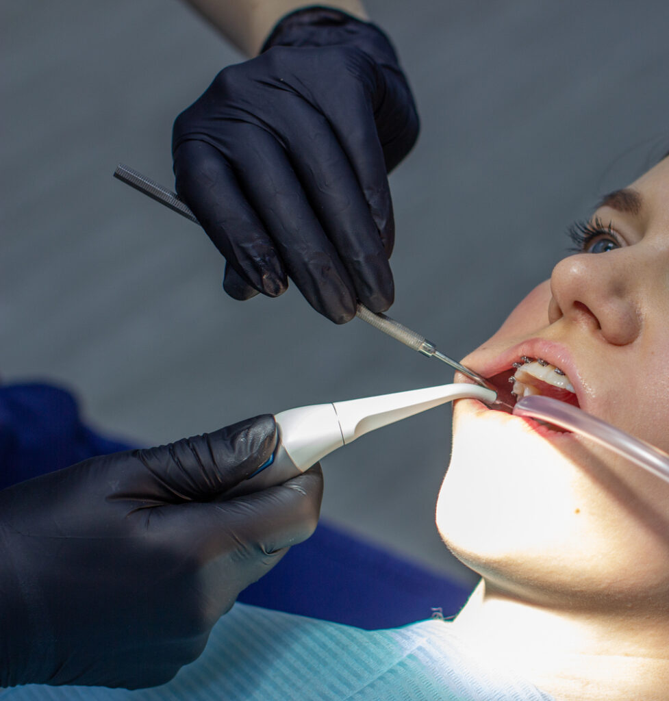 Patient sitting in the chair getting dental work done