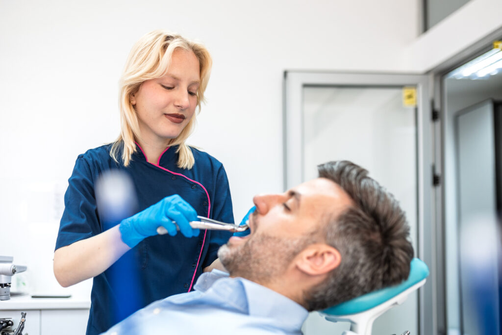 patient undergoing a tooth extraction