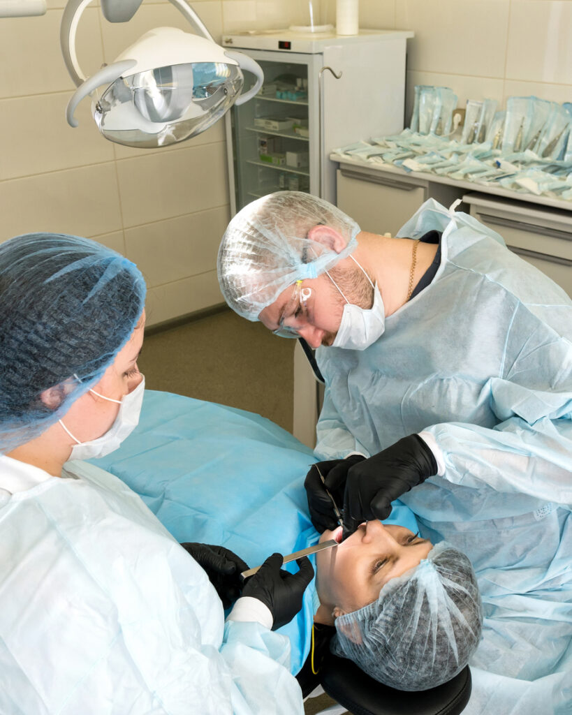 patient undergoing a dental procedure with sedation