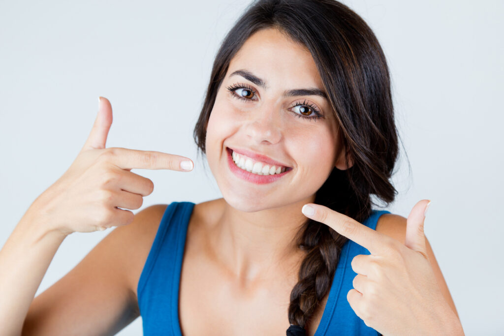 Patient with a healthy smile after treatment